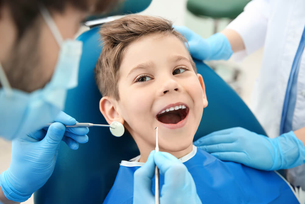 Problemele dentare la copii –  semnal de alarmă pentru părinți
